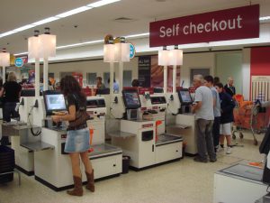 Self-checkout machines at supermarkets replace human workers
